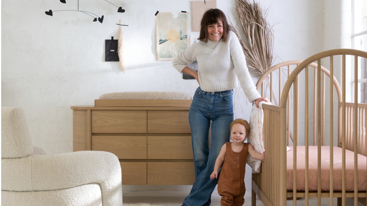 Leanne Ford and baby in stylized nursery